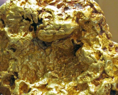 What is gold ore and what is it used for ?